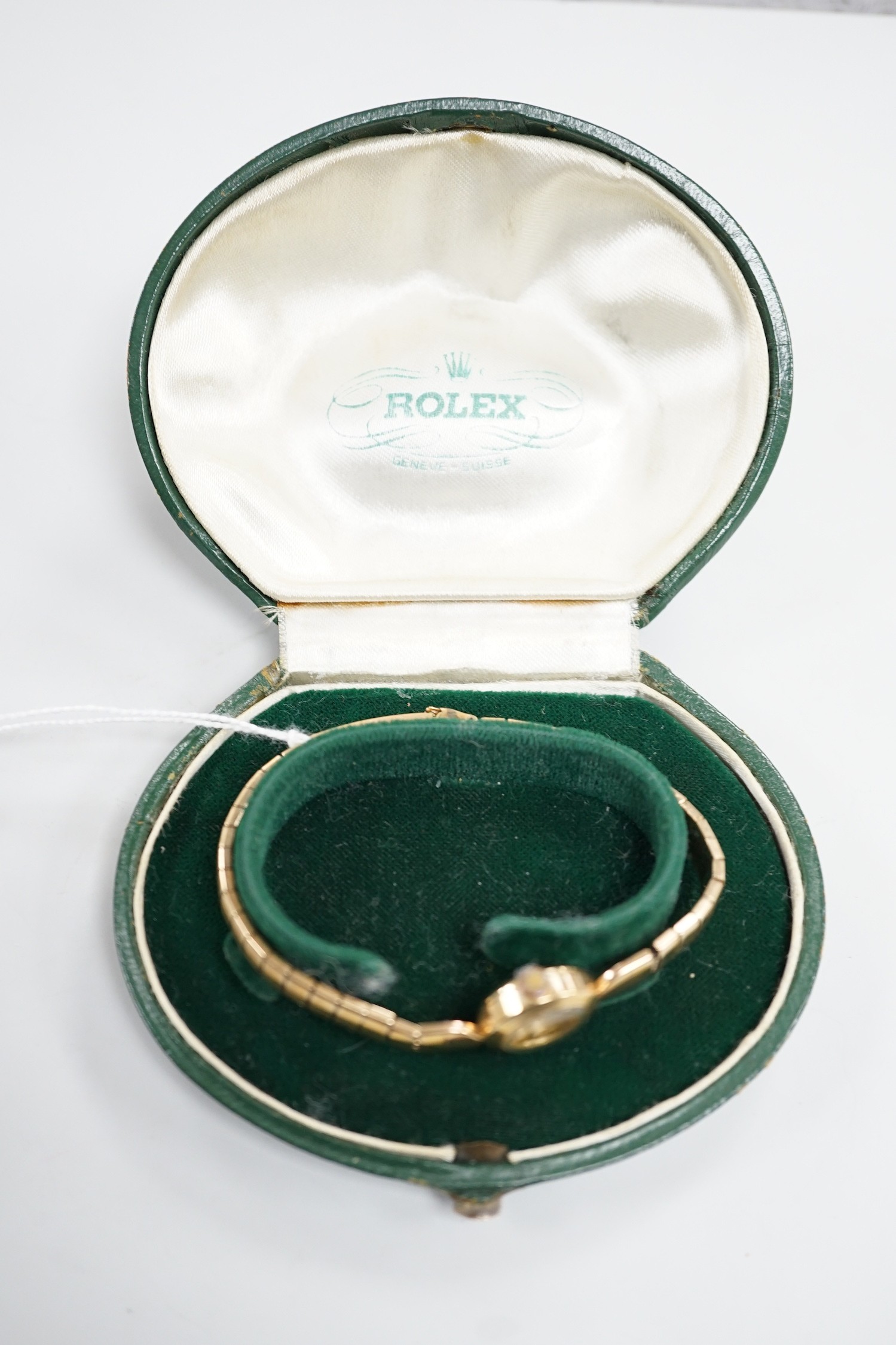 A lady's 9ct gold Rolex Precision manual wind wrist watch, on 9ct gold Rolex bracelet, case diameter 16mm, gross weight 16.8 grams, with Rolex box.